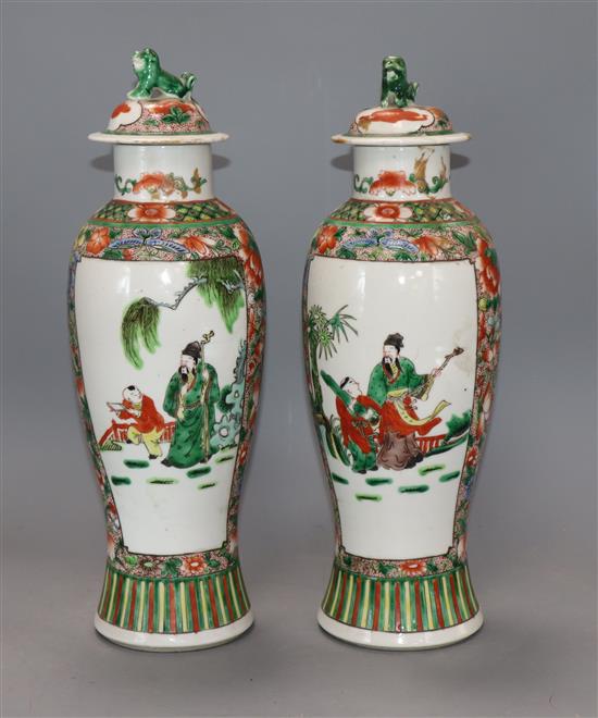 A pair of 20th century Chinese famille verte vases and covers height 35cm